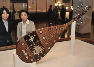 琵琶顶部的,琵琶顶部的“弦轴”的作用是什么梦幻西游科举考试